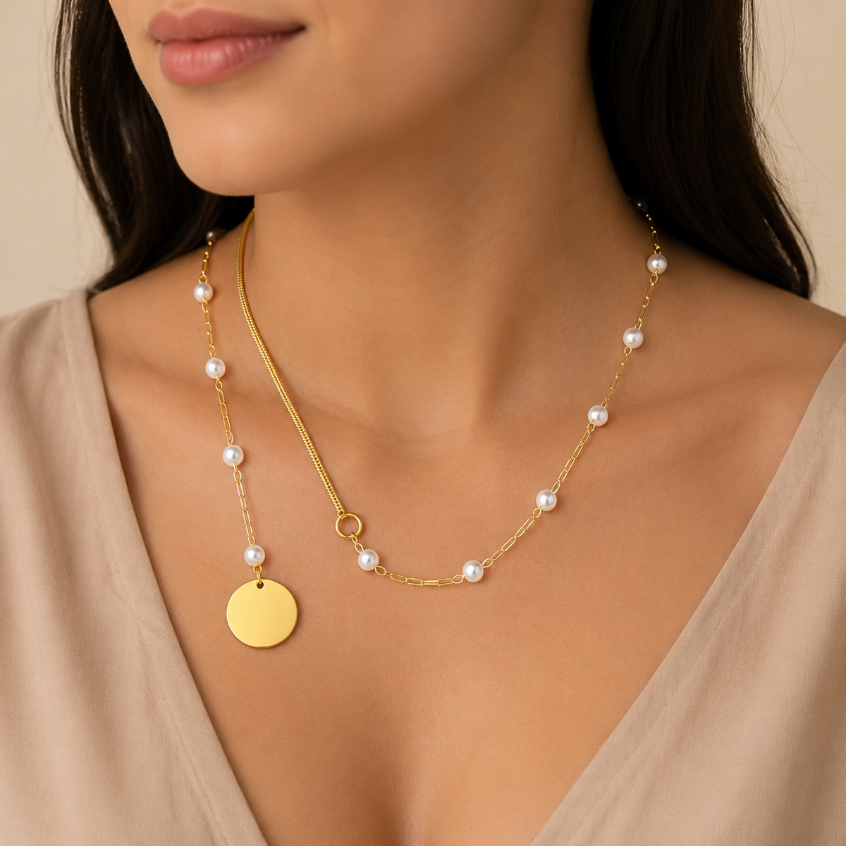 Gold layered necklaces with crystal and bar pendants in a luxury jewelry box